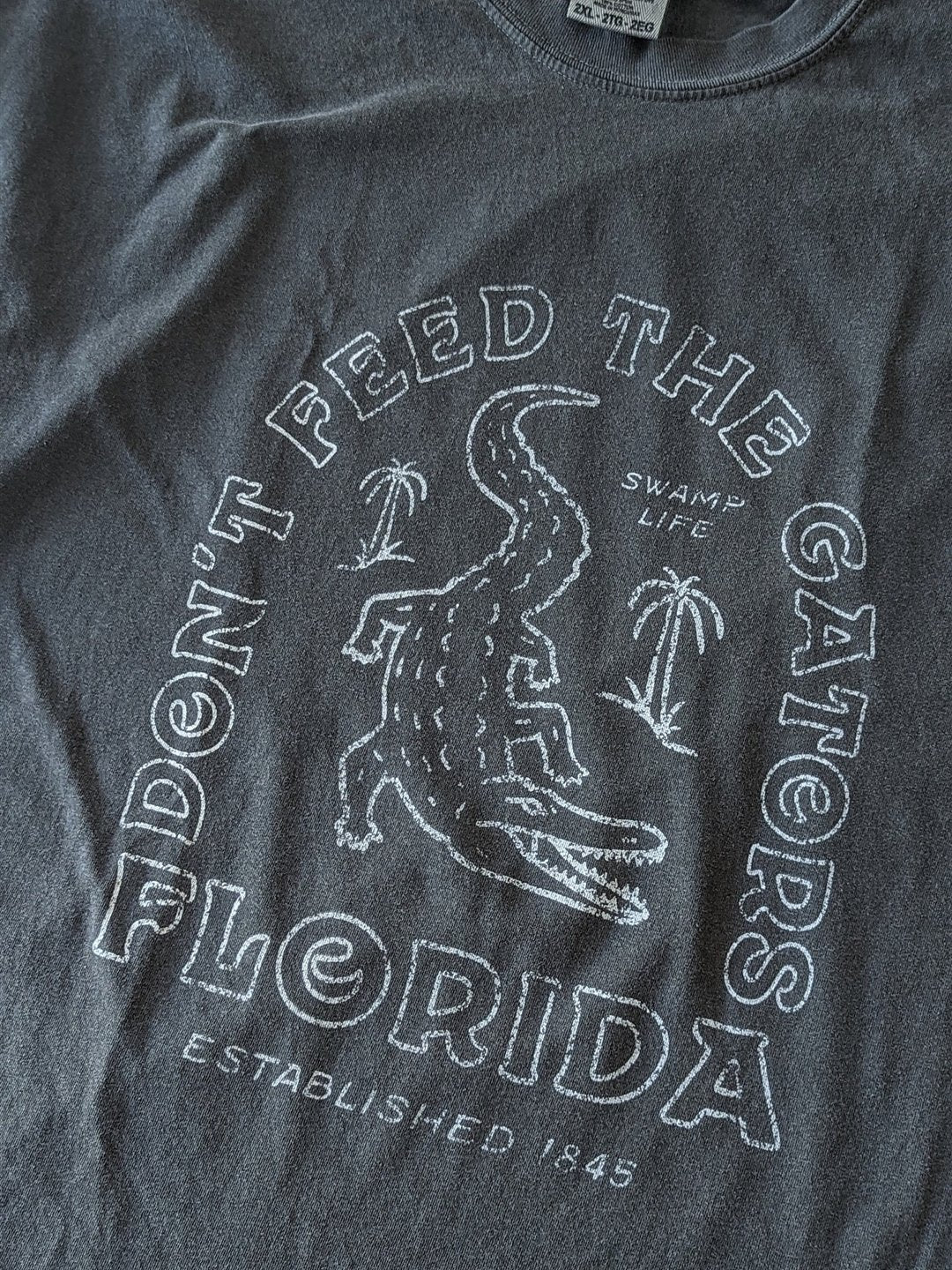 Don't Feed the Gators tee in Pepper, photo from a customer
