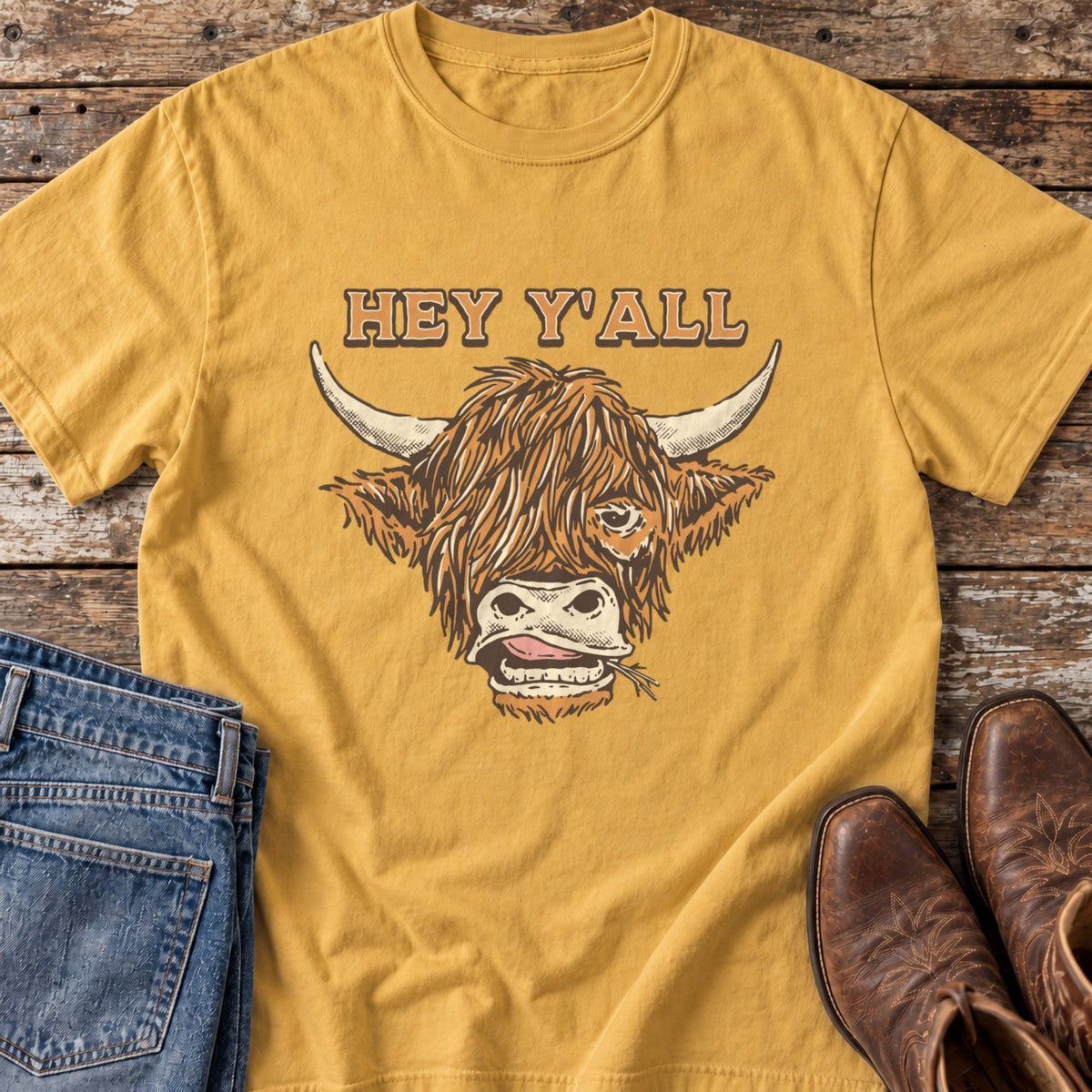 Hey Y'all Highland Cow T-Shirt in Mustard, flat lay